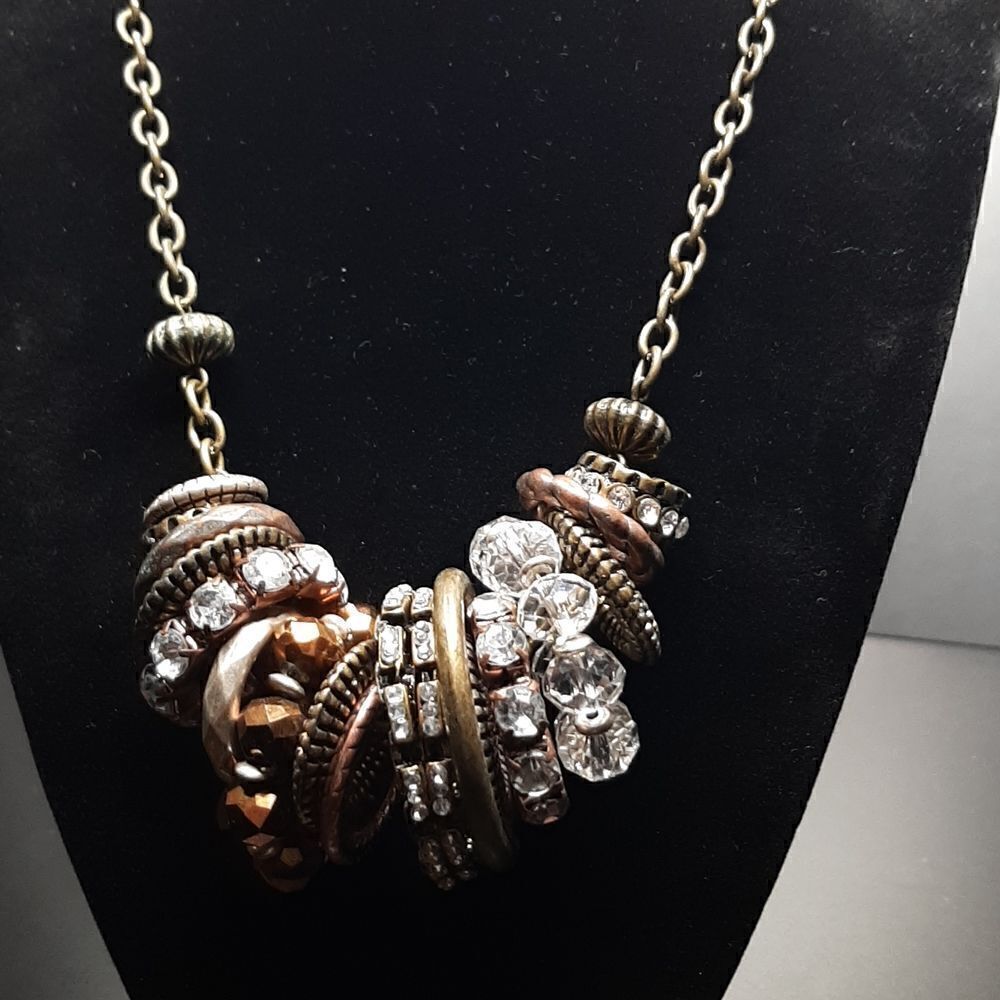 Artisan necklace with copper color chain and dangles